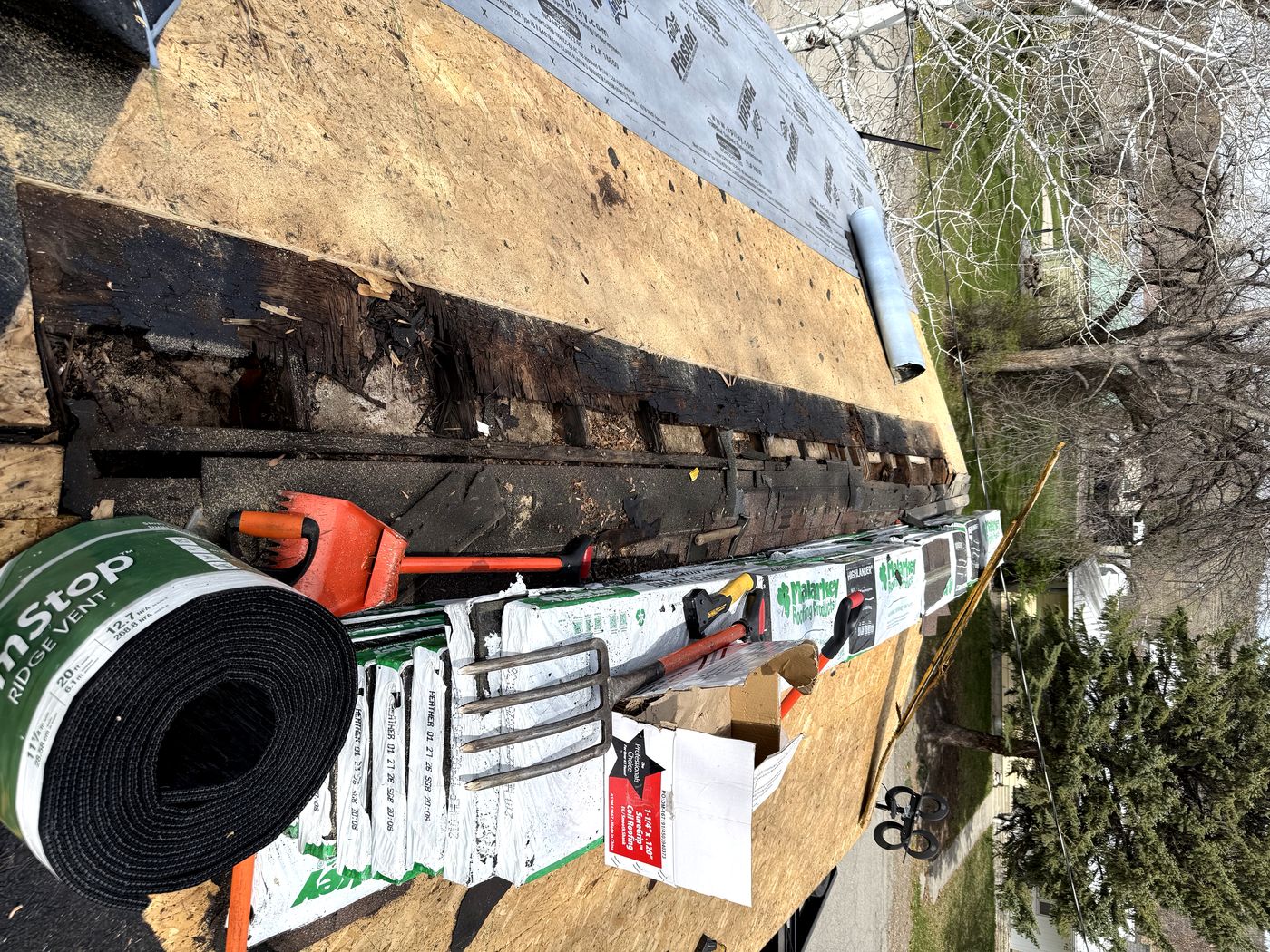 Malarkey shingles being installed