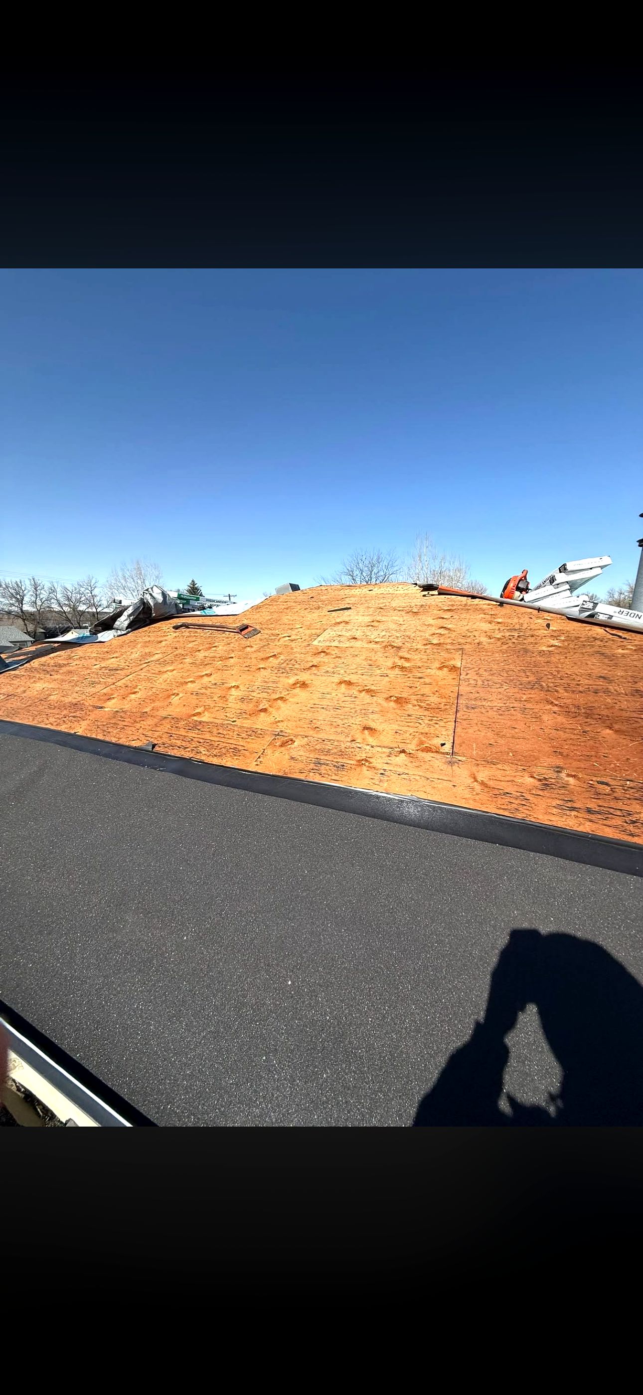 Roof tear off in progress